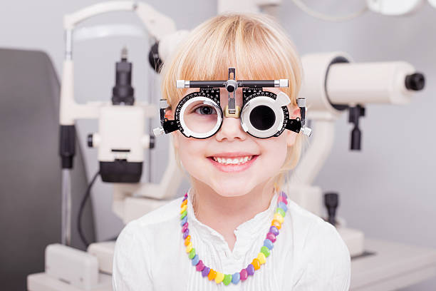 Little girl checking her vision